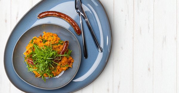 stamppot van zoete aardappel met gedroogde tomaat en rucola