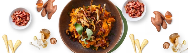 Stamppot van pastinaak en zoete aardappel met paddenstoelen