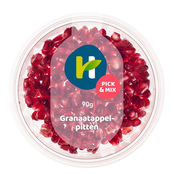 Healthy hand granaatappel pitjes voorkant